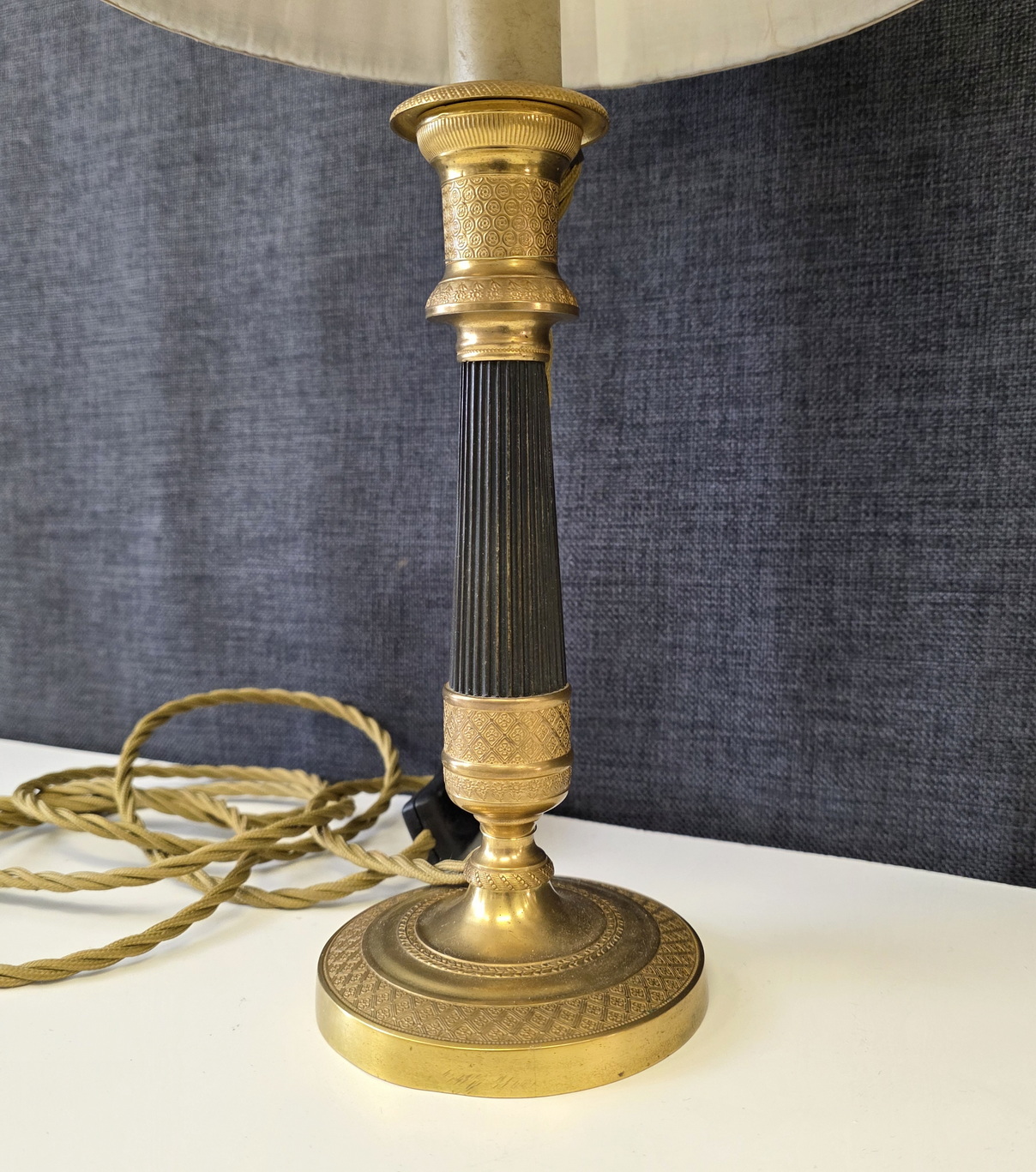 A pair of French Empire lamps 